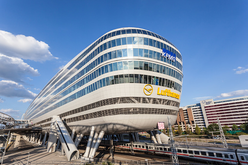 Frankfurt Main, Germany - July 21, 2015: Futuristic office building with a train station in the underground at the Frankfurt International Airport (FRA)