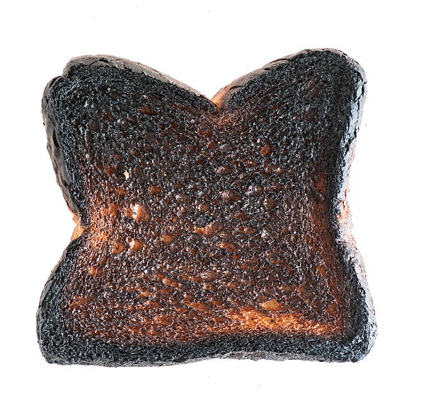 istock Loaf of burnt bread 482730304