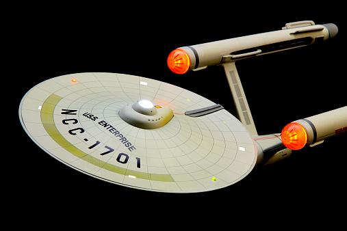 Vancouver, Canada - March 25, 2014:A model of the Federation starship USS Enterprise, commanded by Captain James T. Kirk in the original Star Trek series. The model is made by Art Asylum and released by Diamond Select.