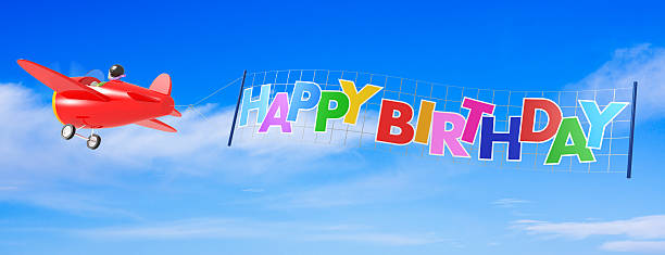 mulher aeronaves com feliz aniversário banner - birthday airplane sky anniversary imagens e fotografias de stock