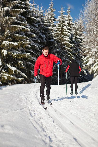 istock Young man cross-country skiing 482730746