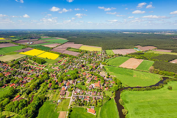 Aerial view of suburban area and agricultural land in Germany Aerial view of a suburban area and agricultural land in Germany.Small village is suburb from Celle, in Lower Saxony, Germany. lower saxony photos stock pictures, royalty-free photos & images