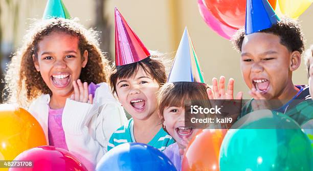 Multiracial Children At A Birthday Party Stock Photo - Download Image Now - Child, Party - Social Event, Birthday