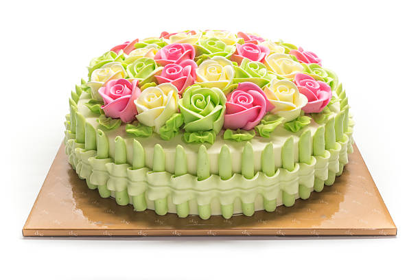 Birthday cake with flowers on white