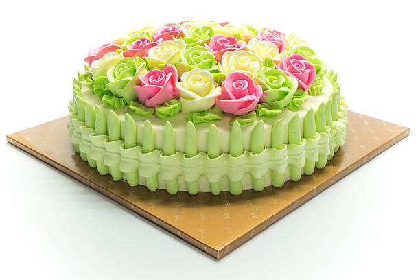 istock Birthday cake with flowers on white 482732972