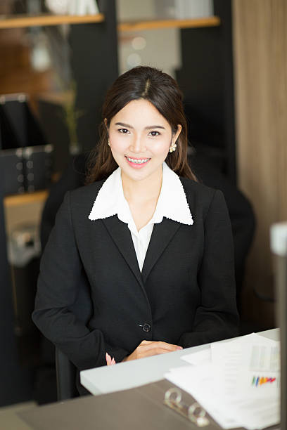 istock Young businesswoman sitting and smiling 482737850