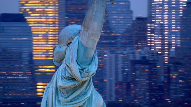 Statue of Liberty at dusk, closeup aerial shot