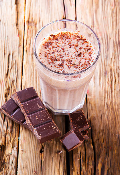 istock Fresh milk shake on wood 482743235
