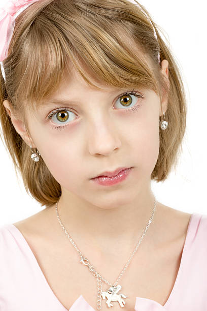 Studio portrait of young beautiful girl with nice eyes on white background