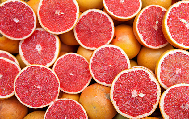 pamplemousse - grapefruit fruit freshness pink photos et images de collection