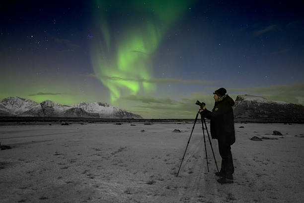 istock Man photographing northernlight 482745463