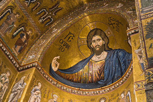 Christ Pantocrator fresco inside Monreale cathedral or Duomo di Monreale near Palermo, Sicily, Italy