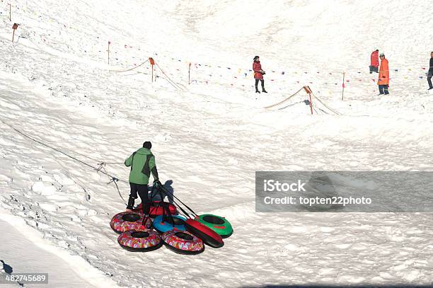 Snow Rubber Tube Used To Play On Jade Dragon Snow Mountain Stock Photo - Download Image Now