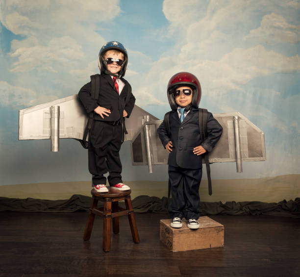 istock Two Boys Wearing Business Suits and Jetpacks 482745969