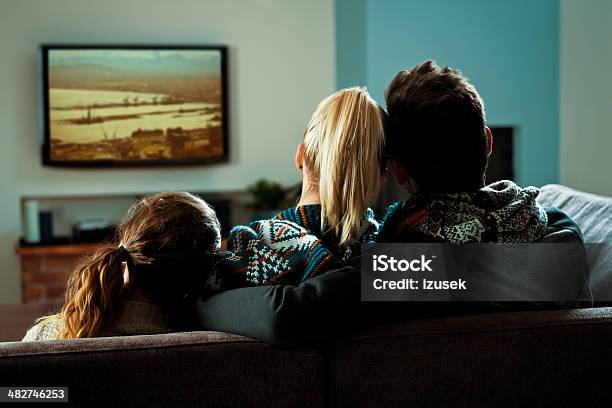 Family Watching Tv Stock Photo - Download Image Now - Television Set, Television Industry, Family