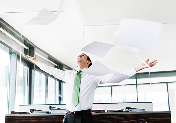 istock Businessman Throwing Paper In Office 482746685