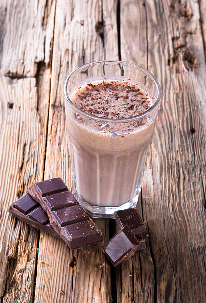 istock Fresh milk shake on wood 482746735