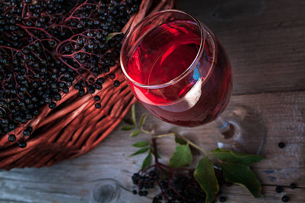istock Autumn Wicker basket with ripe black Elderberries 482747182