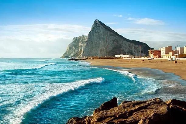The famous "Rock" of Gibraltar as seen from the Mediterranean coast of Southern Spain.