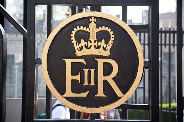 Emblem for &quot;Elizabeth II. Regina&quot; Official Emblem for Queen Elizabeth II ("Elizabeth II. Regina") at gate of "The Tower of London". elizabeth ii photos stock pictures, royalty-free photos & images
