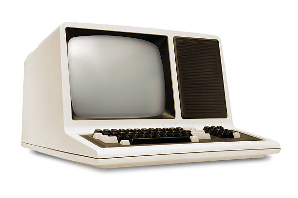 Vintage old computer, rounded monitor, keyboard, eighties revival, white background Vintage old computer from the eighties, with integrated monitor and keyboard. Retro revival style with rounded corners, left side, low angle view, isolated on white background with clipping path. computer mainframe old retro revival stock pictures, royalty-free photos & images