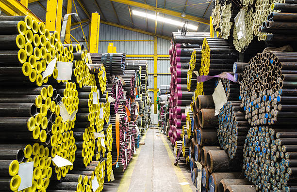 Steel pipes storage in warehouse Steel pipes storage in warehouse with many size pipe smoking pipe stock pictures, royalty-free photos & images