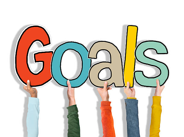istock Group of Hands Holding Word Goals 482751372