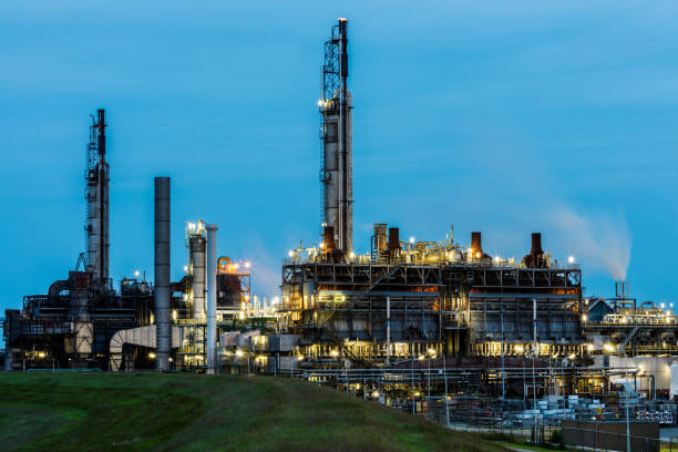 istock Chemical Plant Illuminated at Dusk 482756416