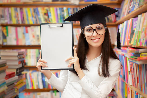 istock Happy School Student Holding Blank Clipboard 482756878