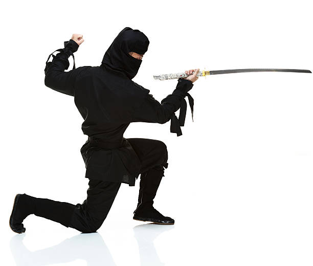 istock Side view of ninja holding sword 482761263
