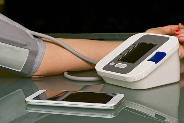 istock Blood pressure gauge and smart phone 482761679