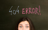 404 Error on a blackboard with girl