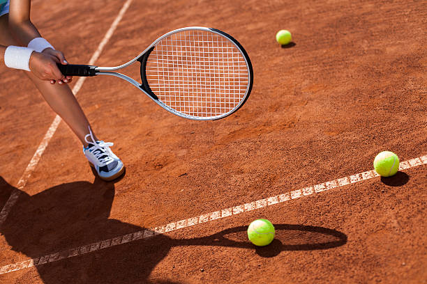 istock Beautiful girl smiling with a tennis racket 482762155