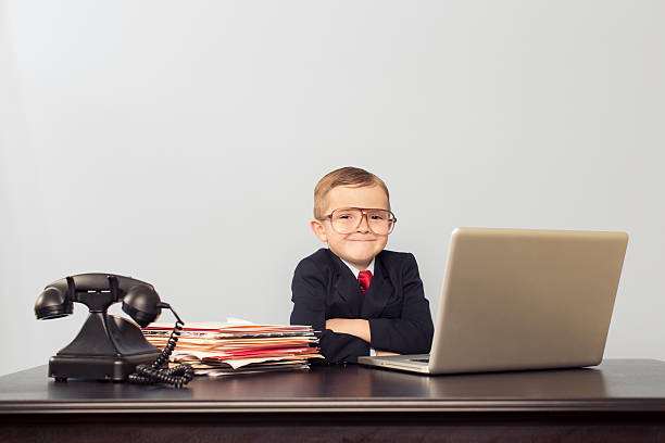 istock Young Boy Financial Advisor at Laptop 482762415