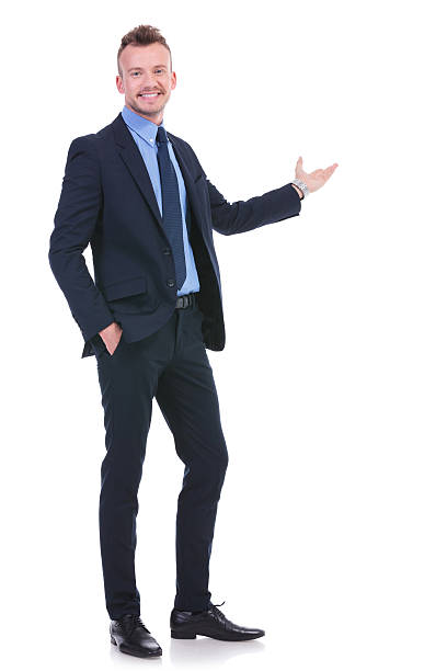 istock business man presents with hand in pocket 482762753