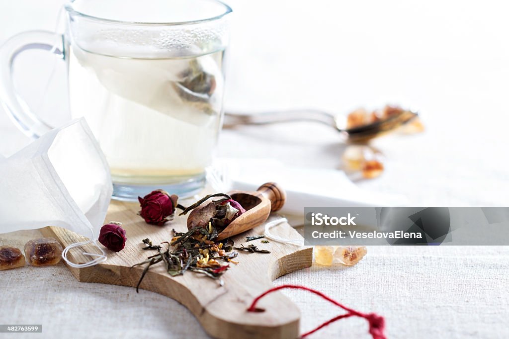 Making tea with teabags Making green tea with rose flowers with teabags Bag Stock Photo