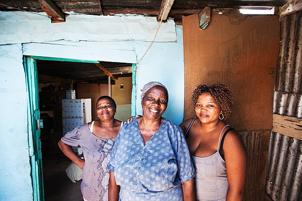 istock African Women outside their Home 482763899