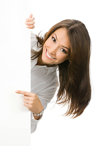 Businesswoman showing blank signboard, on white stock photo