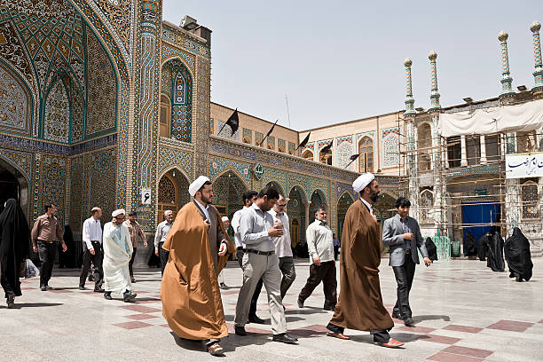 Iran Qom- Iran. -may 14,2013: Mullahs in Fatima Masumeh shrine.  mullah photos stock pictures, royalty-free photos & images
