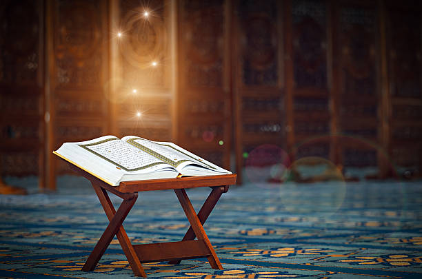 Quran in the mosque Quran - holy book of Muslims, in the Malaysian mosque koran photos stock pictures, royalty-free photos & images
