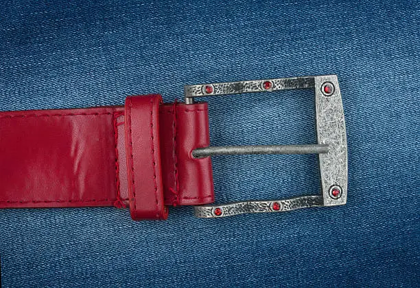 Photo of Red strap is on denim