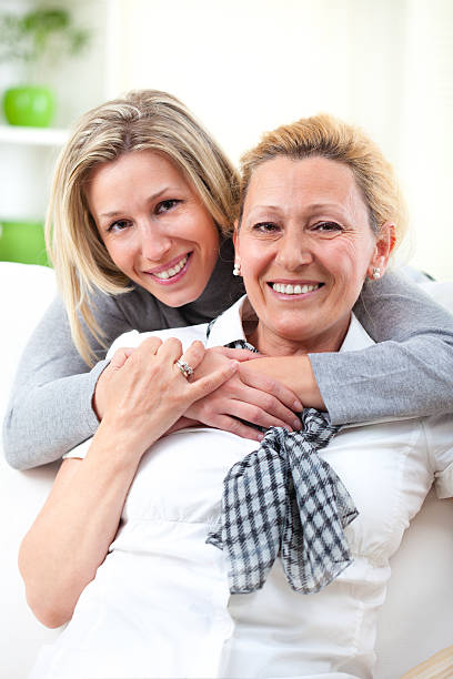 istock Smiling middle-aged mother with young daughter 482767487