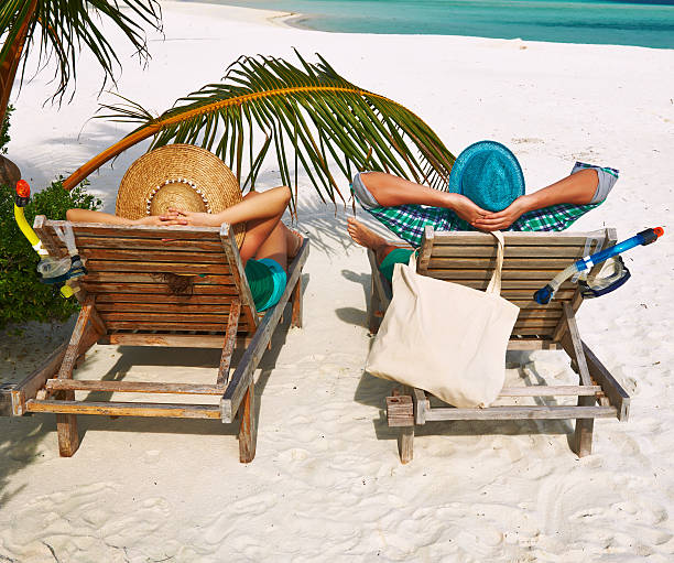 istock Couple in green on a beach at Maldives 482767691