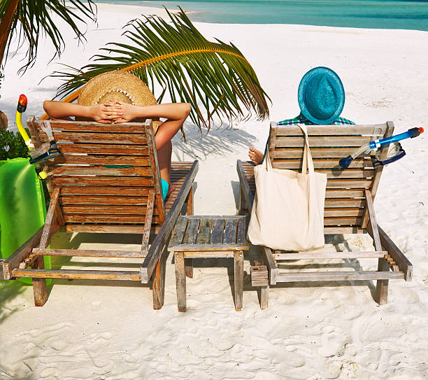 istock Couple in green on a beach at Maldives 482767847