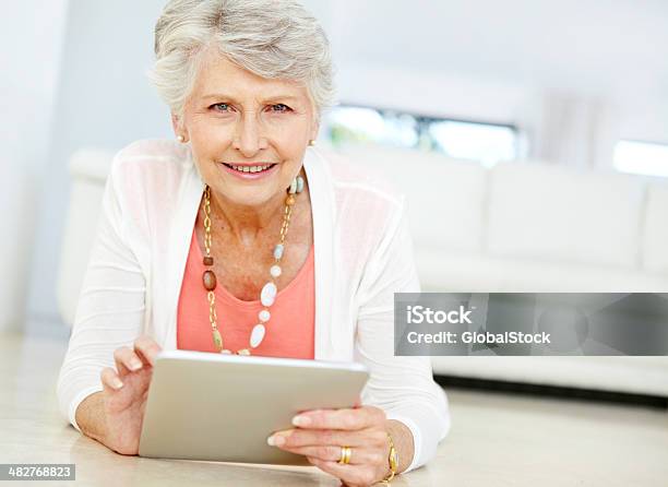 Modern Senior Woman And Technology Stock Photo - Download Image Now - Adult, Adults Only, Casual Clothing