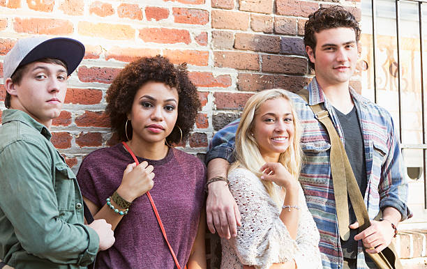 istock Two young multiracial couples hanging out together 482770036