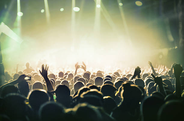 istock People at concert party. 482778580