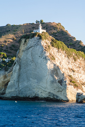 Lighthouse of Cape Miseno, view from sea, Naples, Italy.