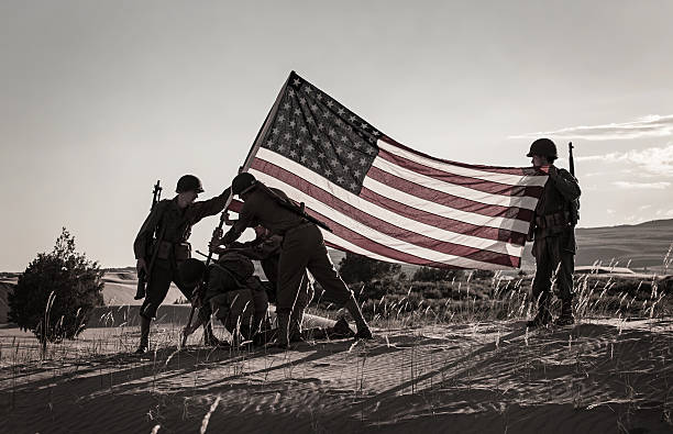 Soldiers Raising the US Flag Soldiers Raising the US Flag (Stock Image) veteran photos stock pictures, royalty-free photos & images
