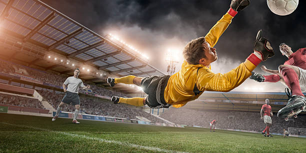 istock Soccer Goalie in Mid Air Save 482785475